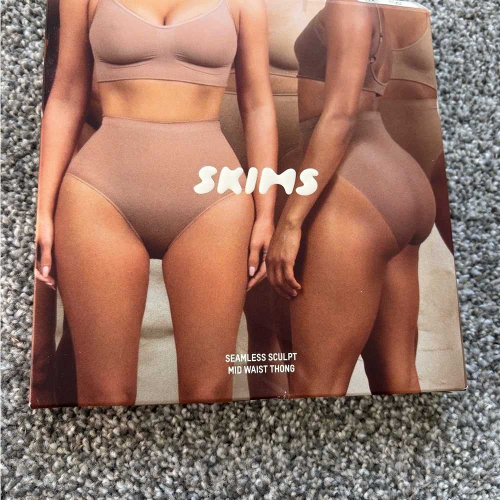 SKIMS Seamless Sculpt Mid Waist Thong in Brown
